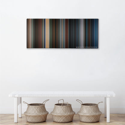 Mr. & Mrs. Smith color palette canvas above a white bench with three woven baskets