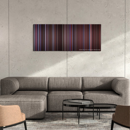 Secretary color palette canvas on a concrete wall above a gray sectional sofa