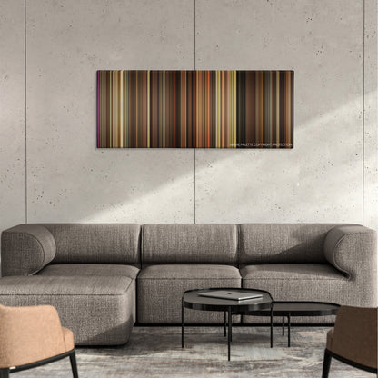 My Week with Marilyn color palette canvas on a concrete wall above a gray sectional sofa