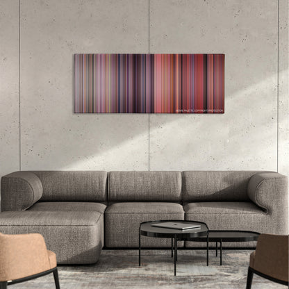 Never Been Kissed color palette canvas on a concrete wall above a gray sectional sofa