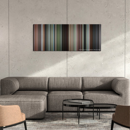Romancing the Stone color palette canvas on a concrete wall above a gray sectional sofa