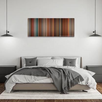 The Ugly Truth color palette canvas above a bed, between two black pendant lamps