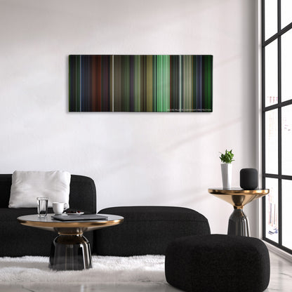 The Matrix Reloaded color palette canvas above a black sofa with a gold-topped table