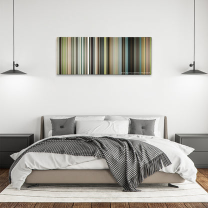Our Idiot Brother color palette canvas above a bed, between two black pendant lamps