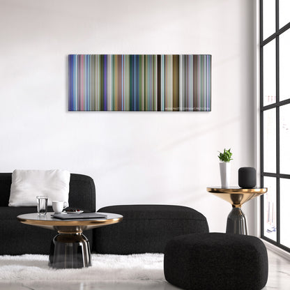 Swades color palette canvas above a black sofa with a gold-topped table