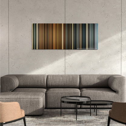 Melancholia color palette canvas on a concrete wall above a gray sectional sofa