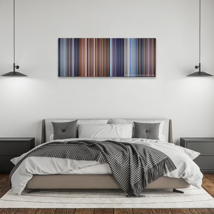 Die Another Day color palette canvas above a bed, between two black pendant lamps
