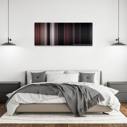 Rebel Without a Cause color palette canvas above a bed, between two black pendant lamps