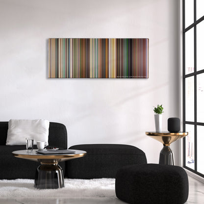 Kick-Ass color palette canvas above a black sofa with a gold-topped table
