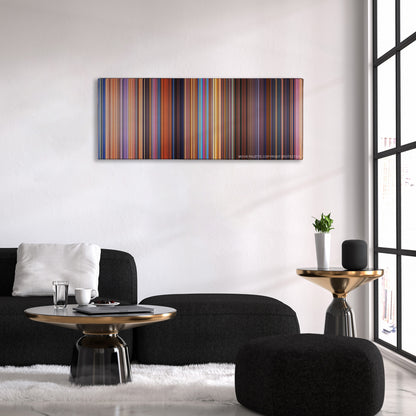 Toy Story 2 color palette canvas above a black sofa with a gold-topped table