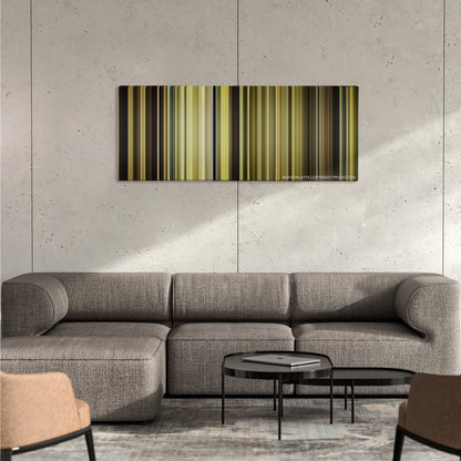 Enemy color palette canvas on a concrete wall above a gray sectional sofa