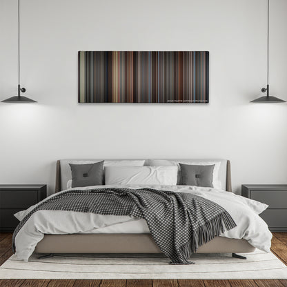 Hidden Figures color palette canvas above a bed, between two black pendant lamps