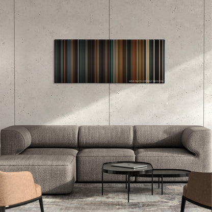 La Vie En Rose color palette canvas on a concrete wall above a gray sectional sofa