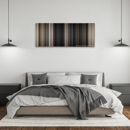 A Fistful of Dollars color palette canvas above a bed, between two black pendant lamps