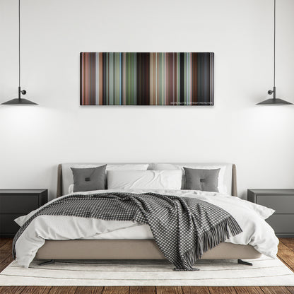Romancing the Stone color palette canvas above a bed, between two black pendant lamps