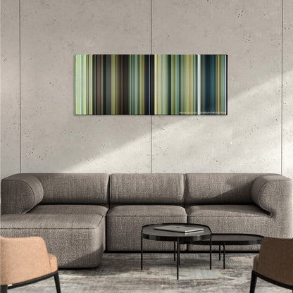 Wonder Woman 1984 color palette canvas on a concrete wall above a gray sectional sofa