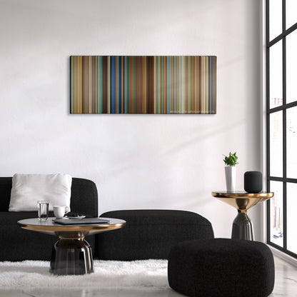 Lucy color palette canvas above a black sofa with a gold-topped table