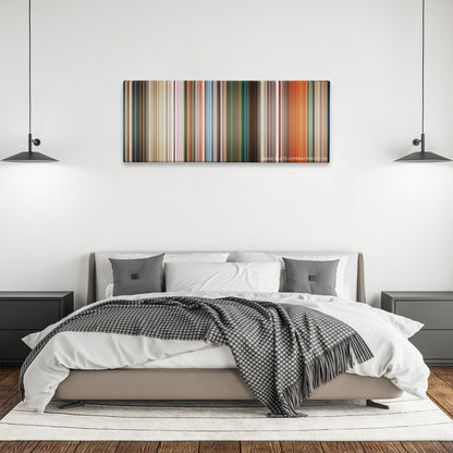 Cashback color palette canvas above a bed, between two black pendant lamps