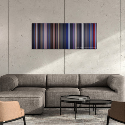 Star Trek: The Motion Picture color palette canvas on a concrete wall above a gray sectional sofa