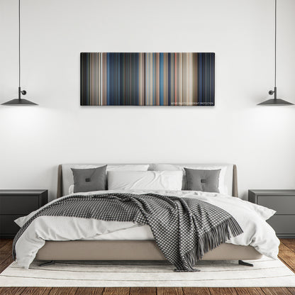 Universal Soldier color palette canvas above a bed, between two black pendant lamps