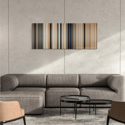 The Longest Yard color palette canvas on a concrete wall above a gray sectional sofa
