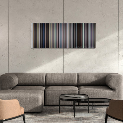 Arlington Road color palette canvas on a concrete wall above a gray sectional sofa