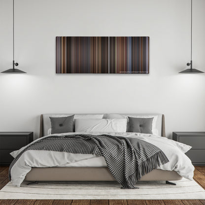 Lara Croft: Tomb Raider color palette canvas above a bed, between two black pendant lamps