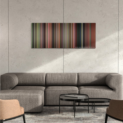 The Karate Kid color palette canvas on a concrete wall above a gray sectional sofa