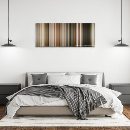 Short Term 12 color palette canvas above a bed, between two black pendant lamps