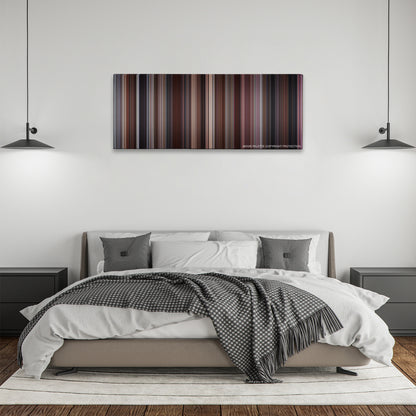 Ghost color palette canvas above a bed, between two black pendant lamps