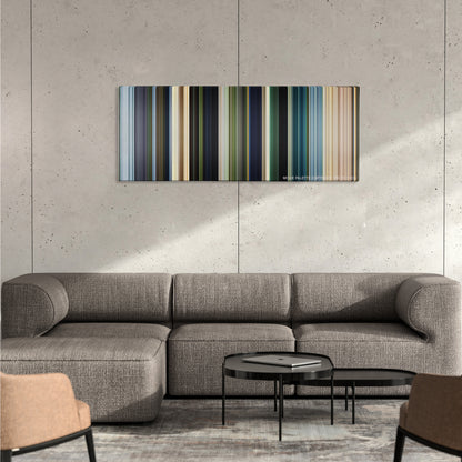 The Legend of Tarzan color palette canvas on a concrete wall above a gray sectional sofa