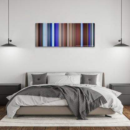 Soul color palette canvas above a bed, between two black pendant lamps