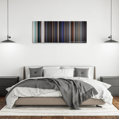 Taking Lives color palette canvas above a bed, between two black pendant lamps