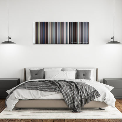 Arlington Road color palette canvas above a bed, between two black pendant lamps