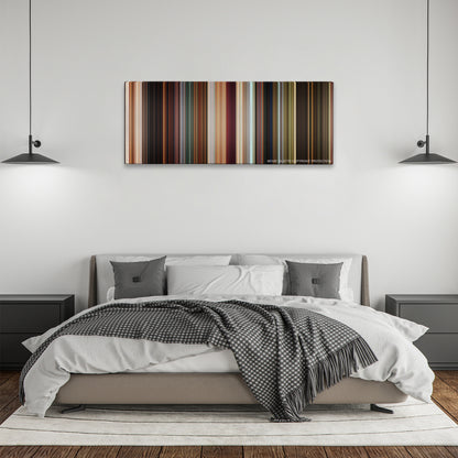 The Croods color palette canvas above a bed, between two black pendant lamps