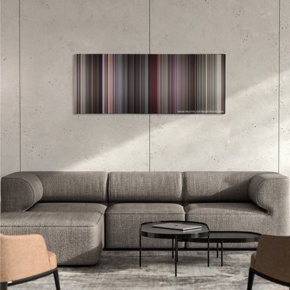 Beverly Hills Cop color palette canvas on a concrete wall above a gray sectional sofa
