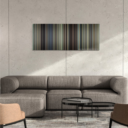 The Danish Girl color palette canvas on a concrete wall above a gray sectional sofa