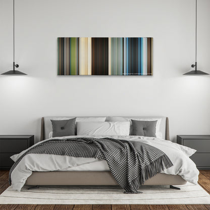 Jumanji: The Next Level color palette canvas above a bed, between two black pendant lamps