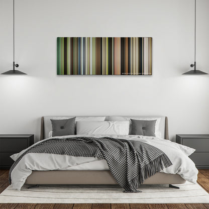 Captain Fantastic color palette canvas above a bed, between two black pendant lamps