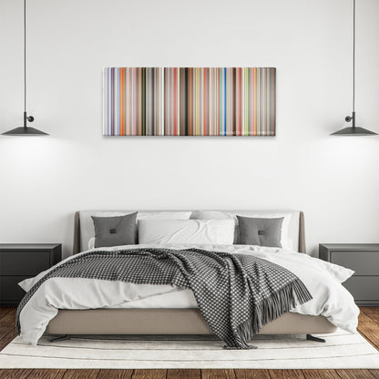 Jackass: The Movie color palette canvas above a bed, between two black pendant lamps