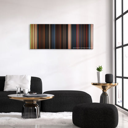 Goosebumps color palette canvas above a black sofa with a gold-topped table