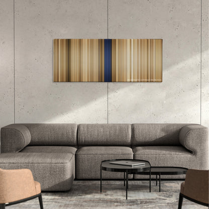 The General color palette canvas on a concrete wall above a gray sectional sofa