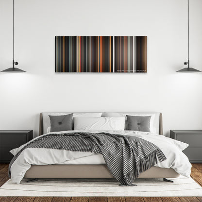 A Monster Calls color palette canvas above a bed, between two black pendant lamps