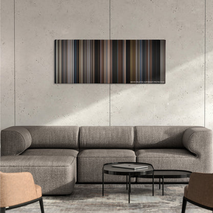 Girl, Interrupted color palette canvas on a concrete wall above a gray sectional sofa