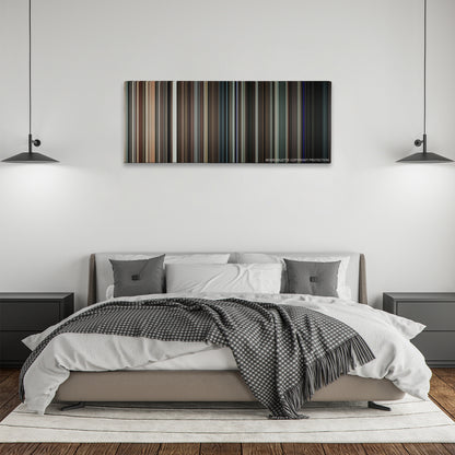 Orphan color palette canvas above a bed, between two black pendant lamps