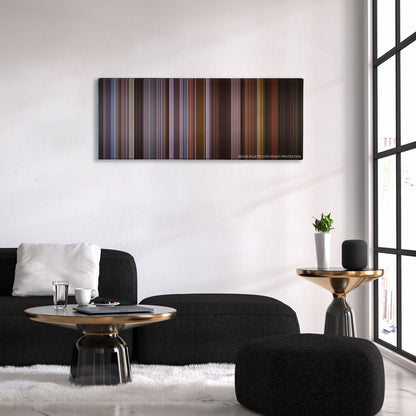 Training Day color palette canvas above a black sofa with a gold-topped table