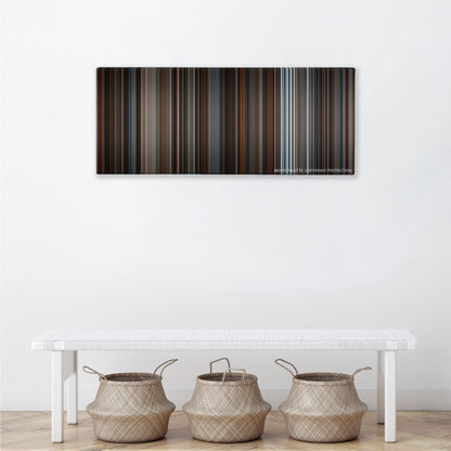 Inception color palette canvas above a white bench with three woven baskets