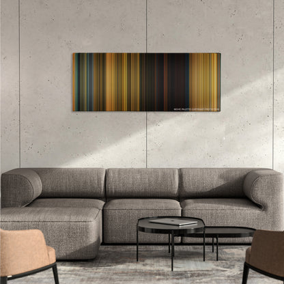 Extraction color palette canvas on a concrete wall above a gray sectional sofa