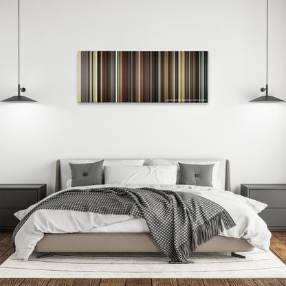 The Great Beauty color palette canvas above a bed, between two black pendant lamps