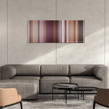 A Cinderella Story color palette canvas on a concrete wall above a gray sectional sofa